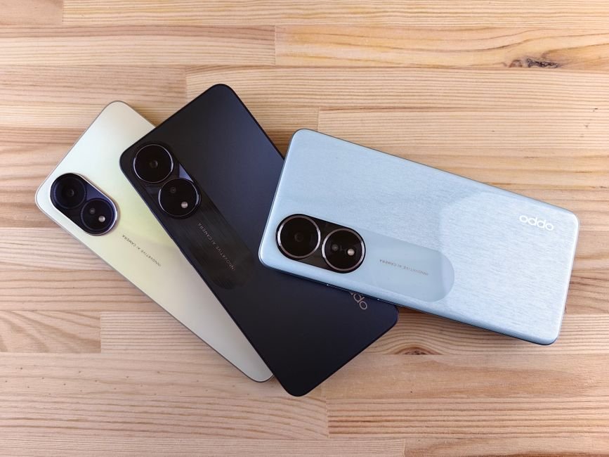 Top rated budget 5G smartphones under 15000 arranged on a wooden desk