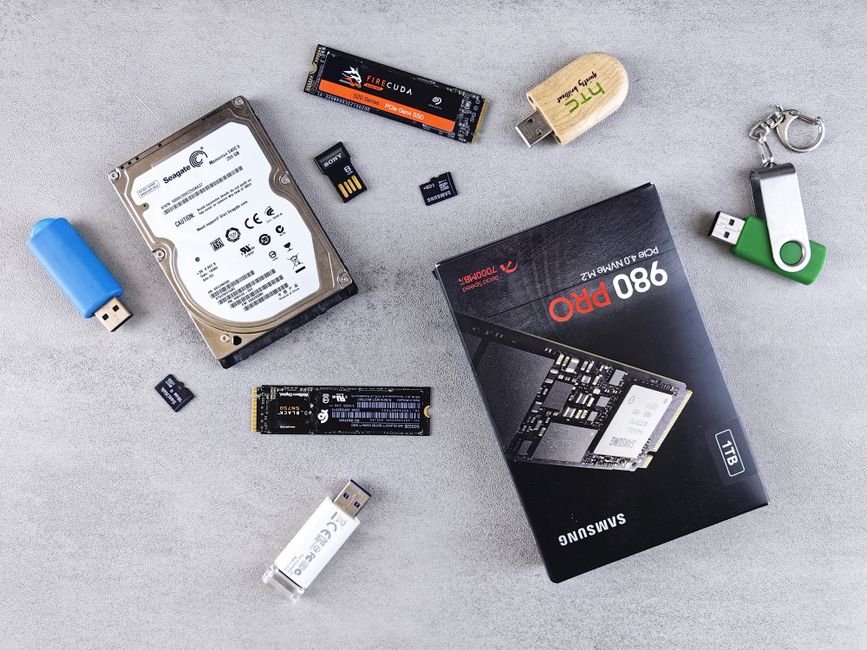 Assortment of modern solid-state memory cards and circuit components