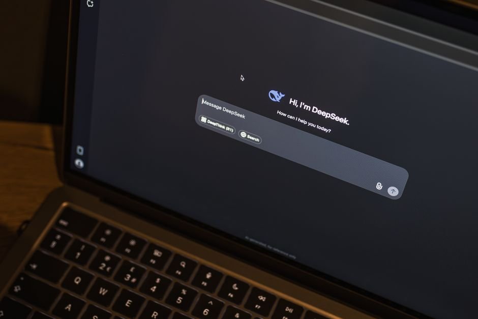 Modern AI chatbot interface operating on laptop screen in productive workspace setting