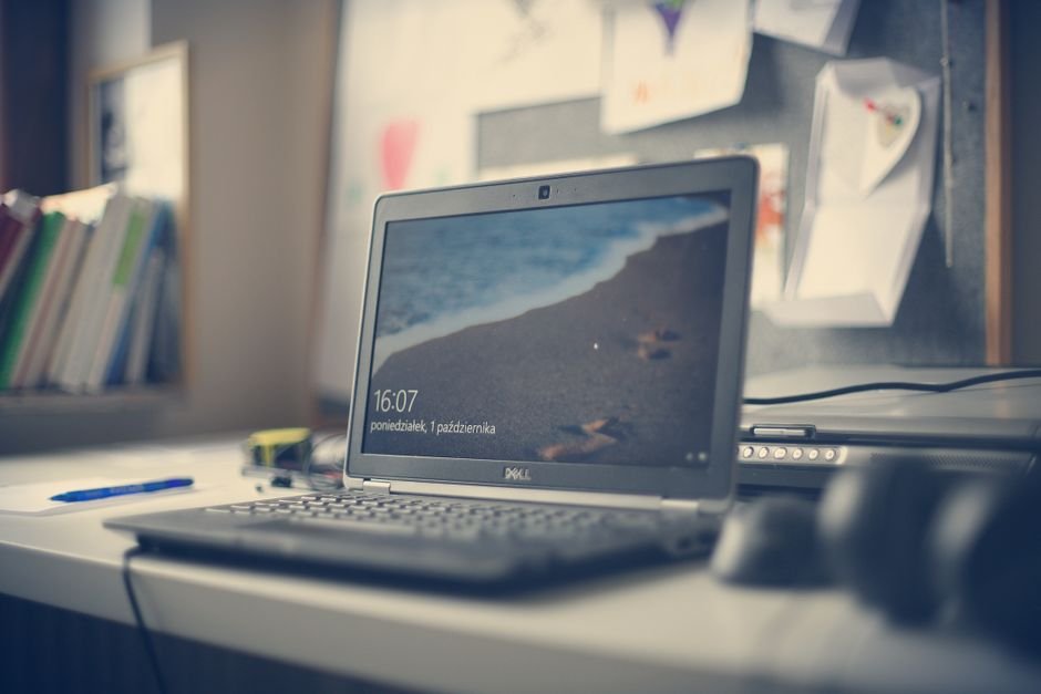 Modern clean desk setup showcasing laptops and computing hardware