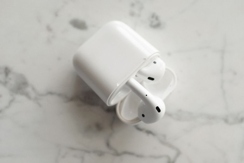 Overhead detail of ergonomic in-ear wireless earphones with silicone ear tips